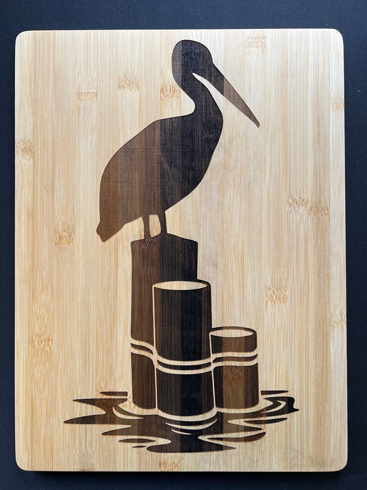 Pelican on Pier Cutting Board
